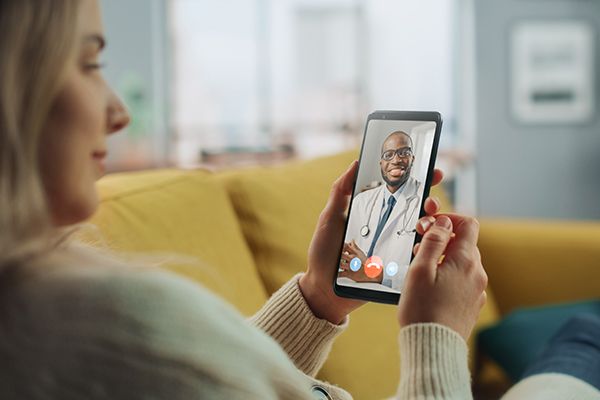 Patient and caregiver receiving admission guidance at hospital